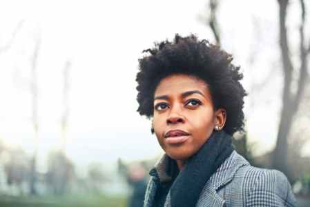 black young woman looking forward